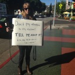 KPCC reporter Meghan McCarty canvasses the streets of Los Angeles with a sandwich board and a microphone. (KPCC photo)
